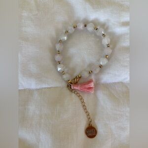 Kinsley Armelle pink gold stone bead Bracelet
With pink tassel